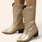 Gold cowboy boots with a pointed black sole and embroidery - N°150